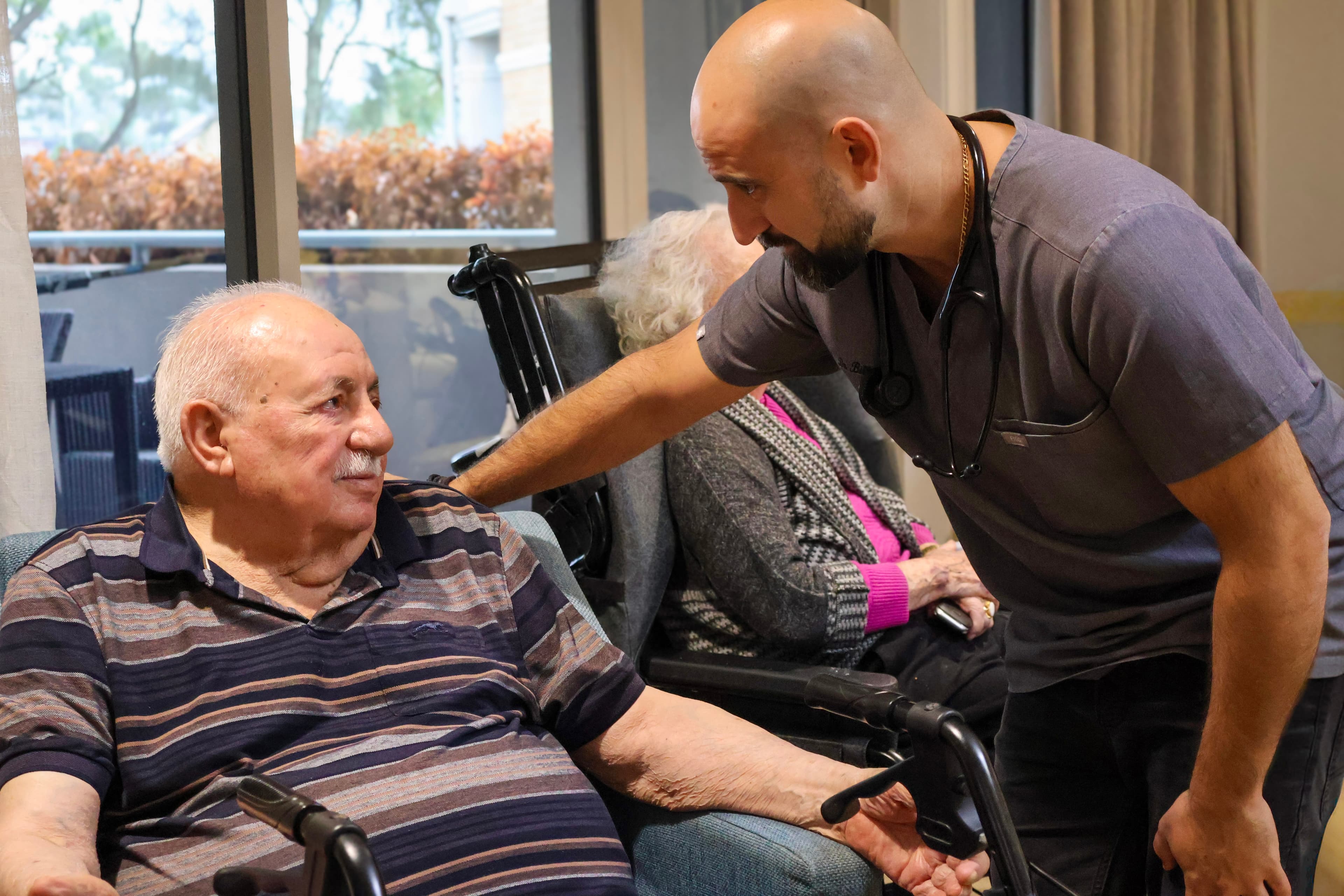 Doctor Billy Stoupas delivering education